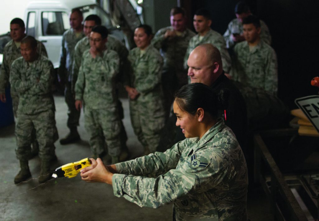 Airman 1st Class Anndora Haraguchi, 154th Security Forces Squadron fireteam member, fires a taser at a target as part of a taser-safety course Feb. 10, 2018, at Gulfport Combat Readiness Training Center, Mississippi. The training was led and one of the several activities leading up to Patriot South, a domestic operations training exercise focused on preparing for any and all challenges faced during a natural disaster. (U.S. Air National Guard photo by Senior Airman John Linzmeier)