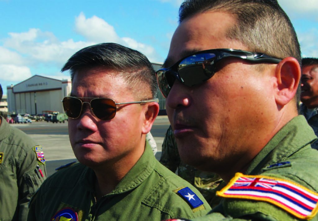 Philippine Air Force Brig. Gen. Antonio Ramon Lim, commander, 5th Fighter Wing, PAF and U.S. Air Force Lt. Col. Scott Oka, commander, 203rd Air Refueling Squadron, Hawaii Air National Guard discuss the capabilities of the KC-135 Stratotanker, Sep. 22, 2017, Joint Base Pearl Harbor-Hickam, HI. The exchange was part of the National Guard’s State Partnership Program which builds relationships through military-to-military engagements in support of defense security goals. (U.S. Air National Guard photo by Senior Airman Orlando Corpuz)