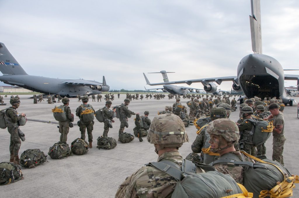 Members of the U.S. Army 1st Battalion, 503rd Infantry Regiment, 173rd Airborne Brigade and Spanish Army Airborne Brigade prepare to board a C-17 Globemaster III during exercise Bayonet Strike June 12, 2018, at Aviano Air Base, Italy. Personnel and equipment were transported and airdropped by members of the Hawaii Air National Guard’s 204th Airlift Squadron onto Casa De Campo, Zaragoza, Spain for a joint-forcible entry operation. The operation served as a training requirement for the participating soldiers, qualifying them to rapid assemble and deploy virtually anywhere in the European Theater. (U.S. Air National Guard photo by Senior Airman John Linzmeier)