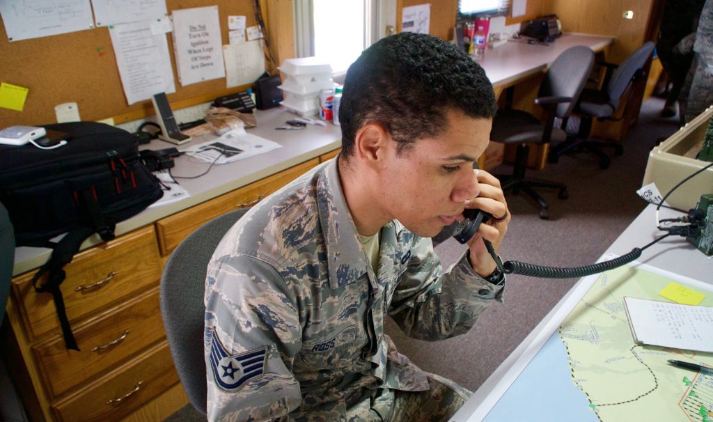 Staff Sgt. Skyler Ross, Air Traffic Control Specialist for the 297th Air Traffic Control Squadron, checks into the temporary flight restriction airspace in Pahoa, June 8, 2018. Air Traffic Controllers closely monitor the TFR airspace to ensure all missions are completed on time and safely. (U.S. Air National Guard photo by Staff Sgt. James Ro)