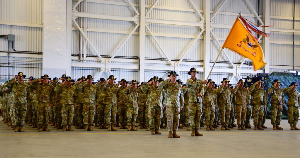 Soldiers from Alpha and Bravo Troops, 1st Squadron, 299th Cavalry Regiment, Hawaii Army National Guard render a salute during their deployment ceremony at the Kalaeloa Army Aviation Support Facility on August 26, 2018. The 1-299th CAV will be deploying to Sinai, Egypt supporting the Multinational Force and Observers while the 29th IBCT will be deploying to Kosovo in support of Multinational Battle Group East Kosovo Forces (KFOR). (U.S. Army National Guard photo by Sgt. 1st Class Theresa Gualdarama)