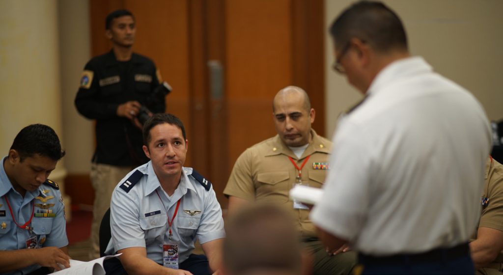 Missouri Air National Guard, Capt. Derek Betz, enumerates the available airlift resources for the Gema Bhakti military planning exercise with a working group of military planners from Tentara Nasional Indonesia and U.S. Military, Sept. 19, 2018, Jakarta Indonesia. (U.S. Air National Guard Photo by Tech. Sgt. Andrew Jackson)