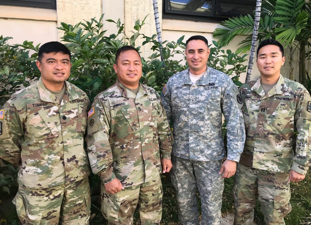 Lt. Col. Tino Tumpap, Sgt. 1st Class Chester Desiderio, Warrant Officer One Andre H. Varea, Capt. Brian Kwak, and (not pictured) Capt. Marco Hartanto recently assisted in fighting a structure fire in Honolulu Hawaii during their lunch break.