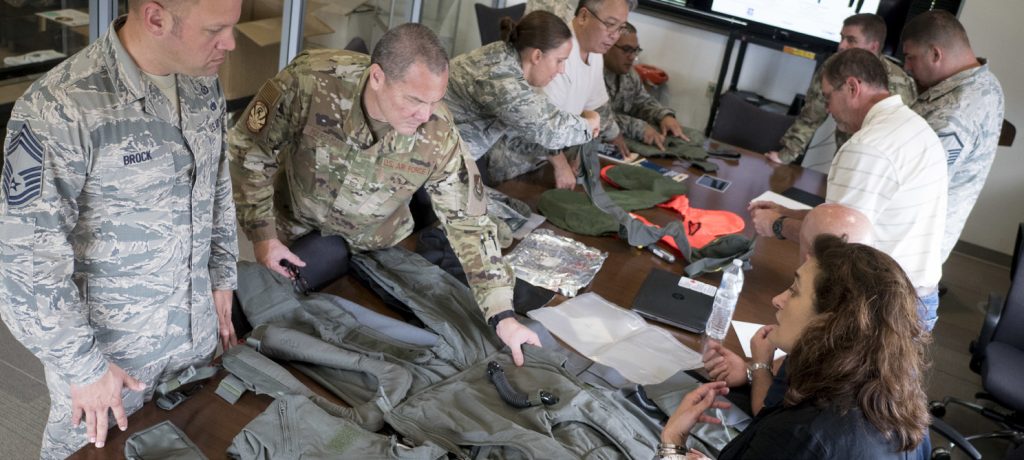Aircrew Flight Equipment Airmen from the 154th and 15th Operations Support Squadrons examine the latest installments of equipment July 8, 2019 at Joint Base Pearl Harbor-Hickam, Hawaii. (U.S. Air National Guard photo by Senior Airman John Linzmeier