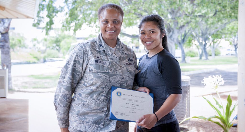 Col. Joyce Merl, 154th Mission Support Group commander, recognizes Airman Anuhea Pikake Alama, 154th Logistics Readiness Squadron materials handler, for her acceptance into the Air Force Academy Preparatory School June 2, 2019, at Joint Base Pearl Harbor-Hickam, Hawaii. Alama has been trying to gain admission to the Air Force Academy since her high school years. The ‘prep school’ is a 10-month-long course which helps prepare students for the AFA’s four-year curriculum. When Airmen and civilians are enrolled, they become ‘cadet candidates.’ (U.S. Air National Guard photo by Senior Airman John Linzmeier)