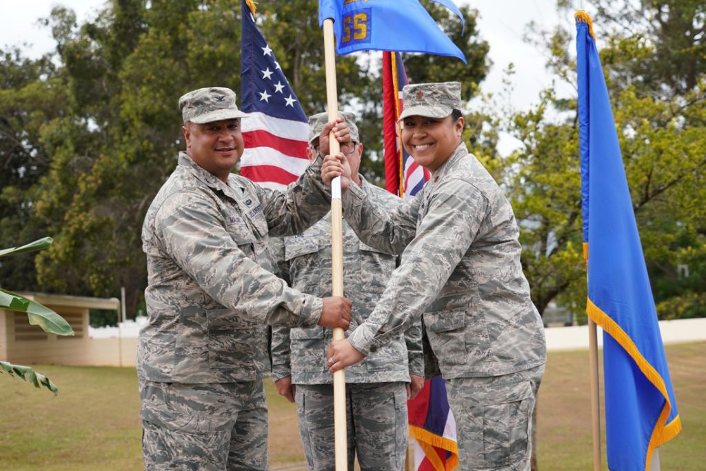 Maj. Mariko Boone accepts command of the newly formed 298th Support Squadron from Col. Phillip Mallory, commander, 298th Air Defense Group during its activation ceremony, Wheeler Army Air Field, August 03, 2019. (U.S. Air National Guard Photo by Tech. Sgt. Andrew Jackson)