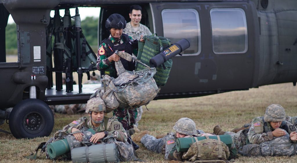Officer Cadets from the University of Hawaii Reserve Officers’ Training Corps, the Hawaii Army National Guard Officer Candidate School and the Indonesian Military practice offloading from a Blackhawk helicopter during an recent joint field training exercise, April 15, 2019 Fort Shafter Flats. (U.S. Air National Guard photo by Tech. Sgt. Andrew Jackson)