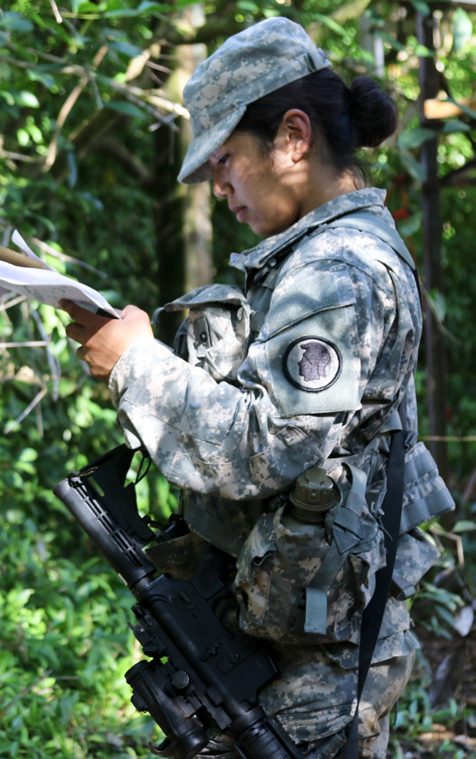 Sgt. Jessica Damato, a member of the Hawaii Army National Guard’s 103d Troop Command, Headquarters and Headquarters Company, orients her map during the Land Navigation event while participating in the Hawaii Army National Guard’s annual Best Warrior Competition at Schofield Barracks in Wahiawa, on March 02, 2019. (U.S. Army National Gaurd photo by Sgt. Kealalaulii Gandia)