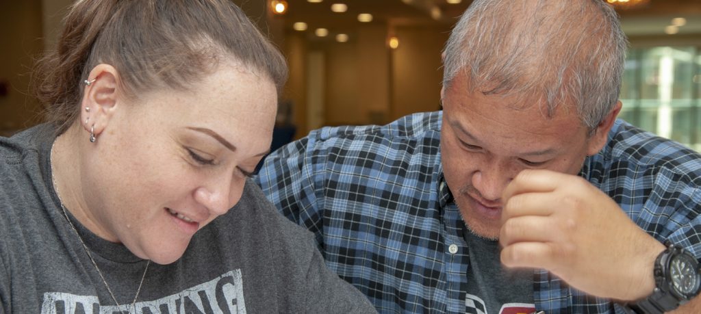 Leina’ala Leong and husband, Tech. Sgt. Samuel Leong, 154th Aircraft Maintenance crew chief complete a relationship evaluation survey as part of a Strong Bonds relationship skills workshop, Mar. 23, 2018, Honolulu, Hawaii. (U.S. Air National Guard photo by Senior Airman Orlando Corpuz)