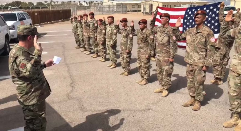 Air Force Gen. Joseph Lengyel, chief, National Guard Bureau, performs a mass re-elistment for Hawaii National Guard members deployed with the Multinational Force and Observers, the Sinai Peninsula, Egypt, May 1, 2019. (U.S. Army National Guard photo by Sgt. 1st Class Jim Greenhill)