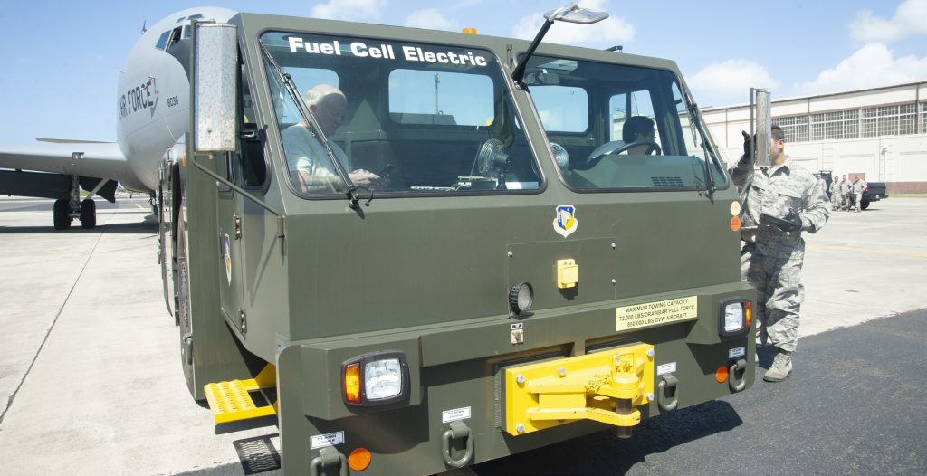 A U-30 Aircraft Tow Tractor is positioned to tow a KC-135 Stratotanker assigned to the Hawaii Air National Guard 203rd Air Refueling Squadron, July 18, 2019, Joint Base Pearl HarborHickam. The tow tractor was powered by hydrogen fuel cells and was part of a demonstration on the capabilities of hydrogen fuel cell technology to power some Airforce operations. The Air Force Research Laboratory on behalf of the Hawaii Center for Advanced Transportation Technologies conducted a demonstration towing on the Stratotanker utilizing a hydrogen fuel cell powered tug. This was the first tug demonstration on a large U.S. Air Force aircraft using the hydrogen fuel cell equipment. The project is a proof of concept demonstration to validate hydrogen vehicle technologies in supporting Air Force mission requirements. (U.S. Air National Guard photo by Tech. Sgt. Alison Bruce-Maldonado)