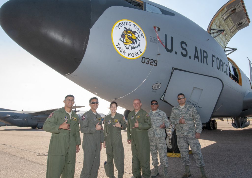 A team from the Hawaii Air National Guard pose for picture in front of KC-135 Stratotanker, tail number 60-0329, Oct. 2, 2019, Colorado Springs, CO. The HIANG team had just completed flyover above the Plaza of Hereos at the U.S. Air Force Academy to honor the contributions of U.S. Air Force graduates who served as KC-135 Stratotanker crew members in the Vietnam War. 60-0329 was the aircraft involved during the 1967 Mackay Trophy mission in which the first ever tri-plane aerial refueling was conducted. (U.S. Air National Guard photo by Senior Airman Orlando Corpuz)