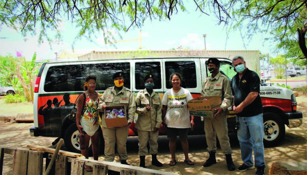 "Service to Community" project drop-off Honolulu, HI. Class 52 Cadets Adams, Hunter, and Lewis join Mr. Donohue in dropping off hand sanitizer and masks made by the Cadets as their "Service to Community" project for the Teen Outreach Program. (Photo by: P. Ganaban).