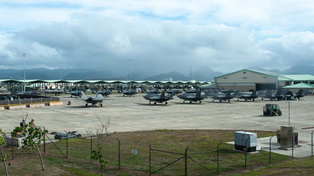 Variants of F-35 Lightning IIs from the U.S. Navy, U.S. Marine Corps, U.S. Air Force and Royal Australian Air Force are stagged at Joint Base Pearl Harbor-Hickam, Hawaii, Dec. 9, 2022, upon the closure of exercise PACIFIC EDGE 23. This iteration of the exercise marked the largest participation of fifth-generation aircraft in an event hosted by the Hawai’i Air National Guard’s 154th Wing. The F-35 participants are from the U.S. Air Force’s 65th Aggressor Squadron, the U.S. Marine Corps Marine Fighter Attack Squadron (VMFA) 314, the Royal Australian Air Force No. 3 Squadron and the U.S. Navy Air Test and Evaluation Squadron Nine (VX-9). The aircraft integrated their capabilities with the locally based F-22 Raptors, operated by the 199th and 19th Fighter Squadrons. (U.S. Air National Guard photo by Staff Sgt. John Linzmeier)