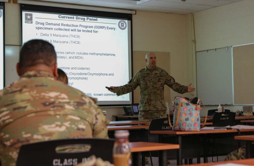 Hawai’i Army National Guard (HIARNG) Soldier Sgt. 1st Class Thomas A. Foster, HIARNG drug testing coordinator, gives a presentation to the class during a Unit Prevention Leader (UPL) Certification Training course, Pearl City, Hawaii, November 14-15, 2022. The UPL Certification Training was a two day course that included instruction on drug testing procedures, and prevention of illicit drugs. (U.S. Army National Guard photo by Spc. Mariah-Alexsandra K. Manandic-Kapu)
