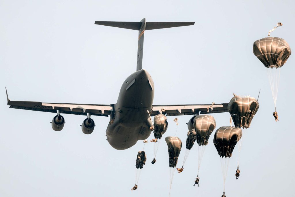 U.S. Army Paratroopers with the 82nd Airborne Division and Royal Thai Army Soldiers conduct a Strategic Airborne Operation during Exercise Cobra Gold 2023, near Thanarat Drop Zone, Kingdom of Thailand, March 2, 2023. Cobra Gold, now in its 42nd year, is a Thai-U.S. co-sponsored training event that builds on the long-standing friendship between the two allied nations and brings together a robust multinational force to promote regional peace and security in support of a free and open Indo-Pacific.(U.S. Army Photo by Staff Sgt. Cayce Watson)