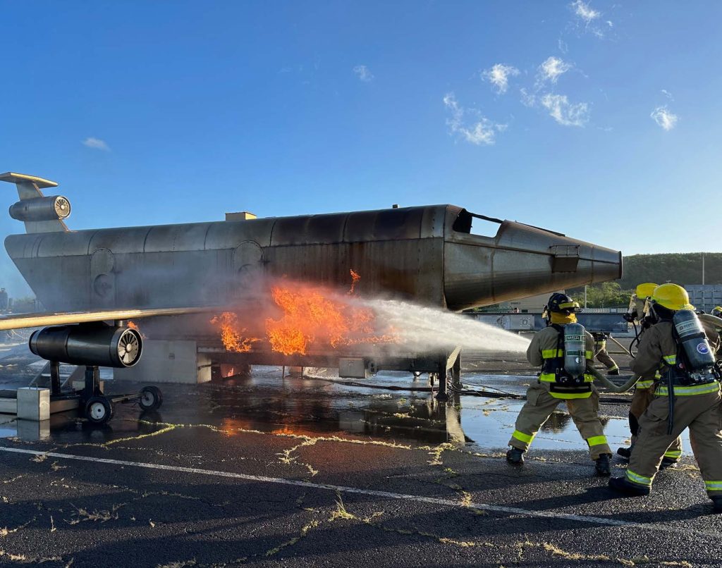 Hawai’i Army National Guard Soldiers assigned to 297th Engineer Firefighting Team, 103rd Troop Command participate in a joint exercise with Air Force Reserves, 624th Civil Engineer Squadron and the Marines Corps, at Marines Corps Air Station Bay, Hawai’i, Feb. 11, 2023. This joint exercise provided training for fire-prevention and protection, aircraft-crash and rescue, natural cover-fire and hazardous material responses within theater operations. (U.S. Army National Guard Photo by Sgt. Randall E. Corpuz )
