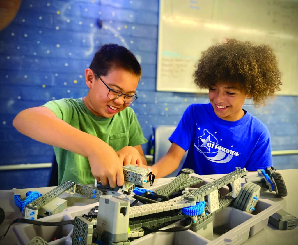 Students participate in the STARBASE Summer Robotics Workshop, a weeklong robotics intensive program where students design, build and program their robots to tackle a variety of challenges. – Ken Smith photo