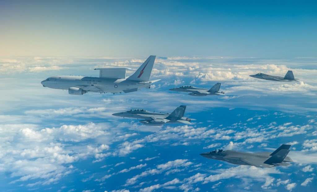 A Hawai‘i Air National Guard F-22 Raptor, U.S. Navy F/A-18E/F Super Hornet and EA-18G Growler from VX-9 China Lake, U.S. Navy F-35 Lightning II from VX-9 Det Edwards, and the Royal Australian Air Force’s E-7A Wedgetail from the No. 2 Squadron fly in formation during Sentry Aloha 24-01 Jan. 30, 2024, Pacific Ocean, Hawaii. Sentry Aloha is an ongoing series of exercises hosted by the HIANG’s 154th Wing enabling tailored, cost effective and realistic combat training for Air National Guard, U.S. Air Force, and other Department of Defense services to provide U.S. warfighters with the skill sets necessary to perform homeland defense and overseas combat missions. (U.S. Navy Courtesy Photo)