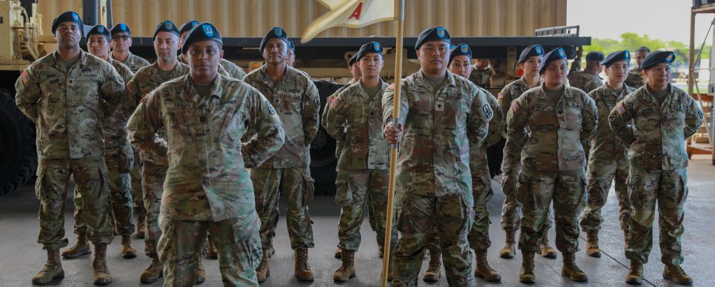 U.S. Army Col. David R. Hatcher II, left, commander of the 29th Infantry Brigade Combat Team (IBCT), Hawaii Army National Guard, passes the unit colors to the incoming commander, Lt. Col. Joshua A. Jacobs, right, of the 29th Brigade Support Battalion (BSB), 29th IBCT, during the 29th BSB change of command ceremony in Kapolei, Hawaii, Jan. 6, 2024. The change of command ceremony is a time-honored tradition within the Army which commemorates the relinquishment of command by passing the unit colors from the outgoing commanding officer to the incoming commanding officer. (U.S. Army National Guard photo by Spc. Bethany Cravalho