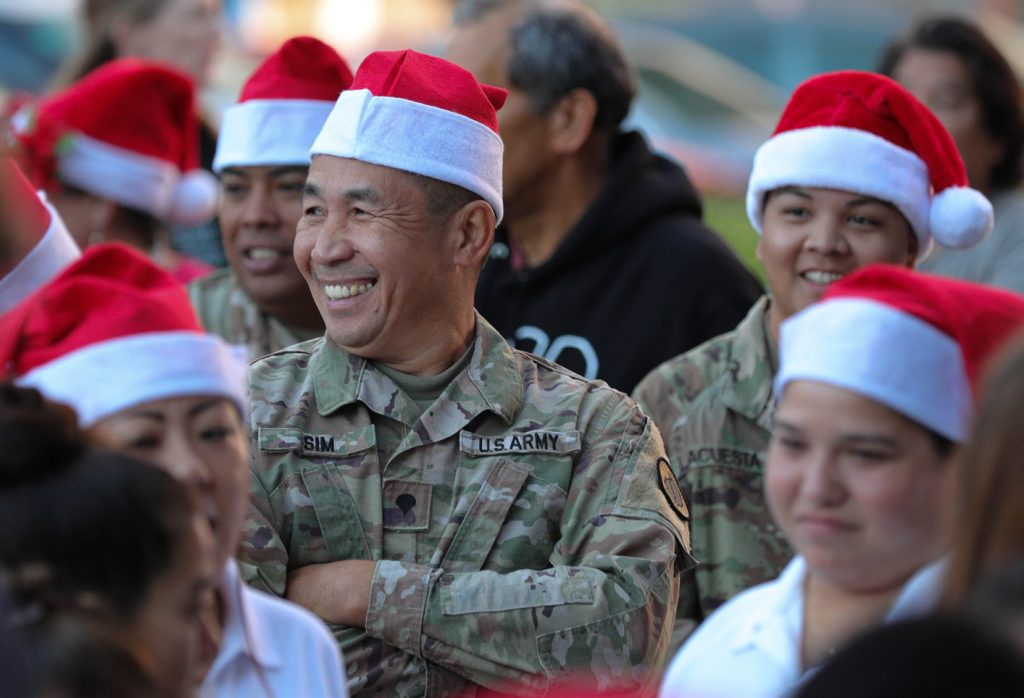 Soldiers and Airmen of the Hawaii National Guard alongside U.S. Coast Guardsmen, and members of the Maui Fire and Police Departments, participate in the “Heroes and Helpers” in Kahului, Maui, Dec.16, 2023. The event involved service members, firefighters, and police officers taking children shopping for the holiday season and was funded by various non-profit organizations. (U.S. Army National Guard photo by Spc. Tonia Ciancanelli)