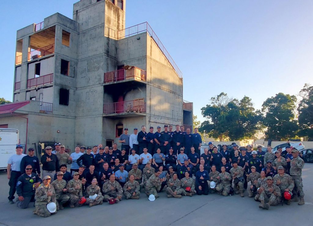 Members of the 154th Medical Group Detachment 1 (DET1) and USAR Team Members from across the nation gather June 6, 2024, during the FEMA Urban Search and Rescue Medical Specialist Course at LivermorePleasanton Fire Training Center in Livermore, Calif. The course provided critical hands-on training in urban search and rescue operations, enhancing the participants’ readiness for real-world emergencies. (courtesy photo)
