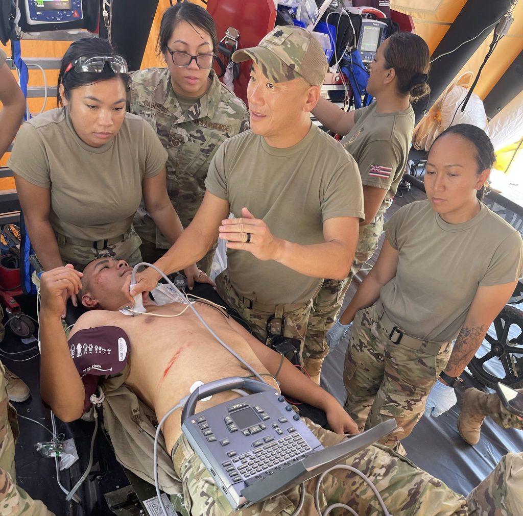 A Hawai‘i Air National Guard Trauma Treatment Team from the 154th Medical Group Detachment 1 attends to a patient June 6, 2024, at Livermore-Pleasanton Fire Training Center in Livermore, Calif. The team demonstrated advanced medical procedures in a simulated disaster scenario as part of the 2024 FEMA Urban Search and Rescue Medical Specialist Course. (courtesy photo)