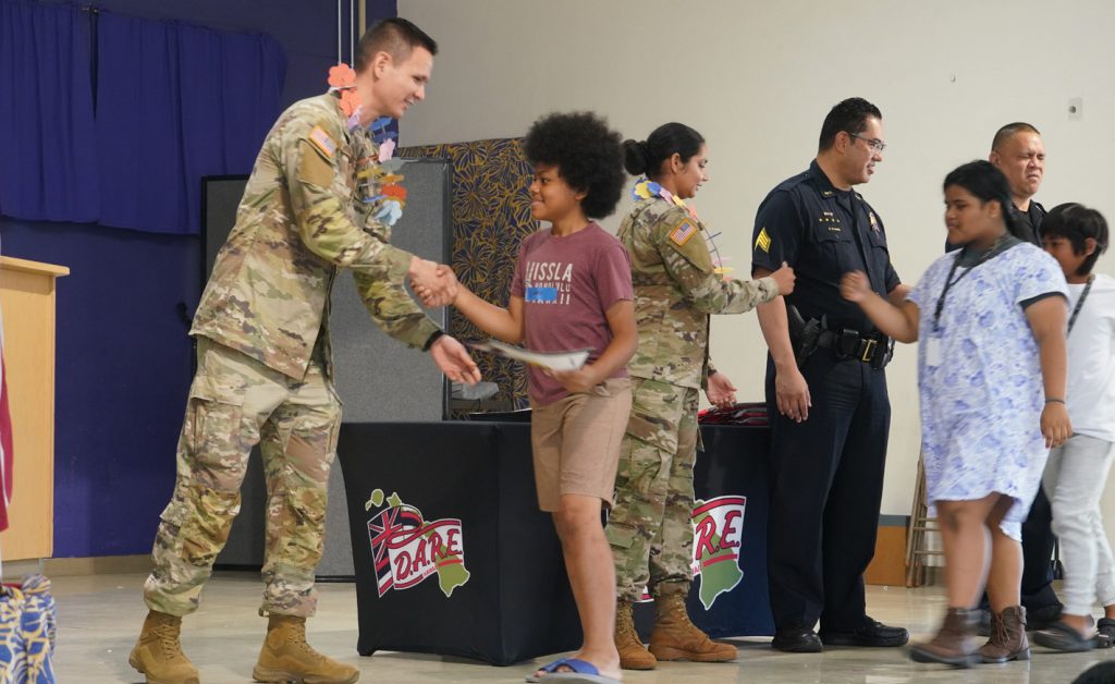 In a joint effort with the Honolulu Police Department, the Hawai‘i National Guard Counter Drug program recently graduated it first Drug Abuse Resistance Education (D.A.R.E) program graduated 80 5th Grade students from Kauluwela Elementary School.