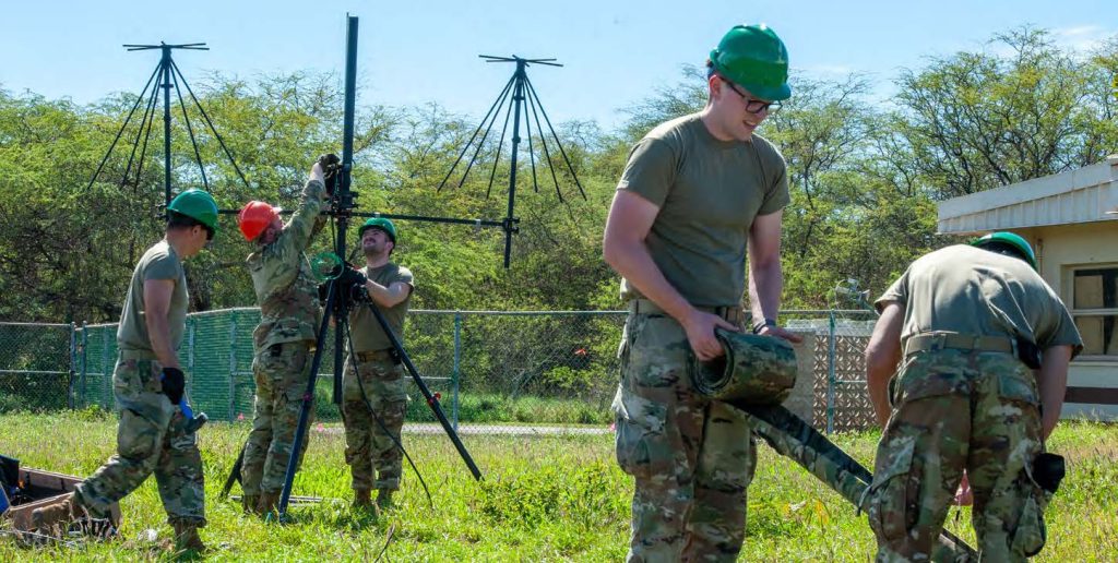 U.S. Air Force Airmen from the 103rd Air Control Squadron set up a cloud-based radar and radio connection of the Tactical Operations Center-Lite (TOC-L), on Feb. 6, 2026 for Sentry Aloha 25-1 at the Pacific Missile Range Facility, Hawaii. TOC-L is a mobile battle management system that allows for decentralized teams to control airspace. (U.S. Air National Guard photo by Senior Airman Roann Gatdula)