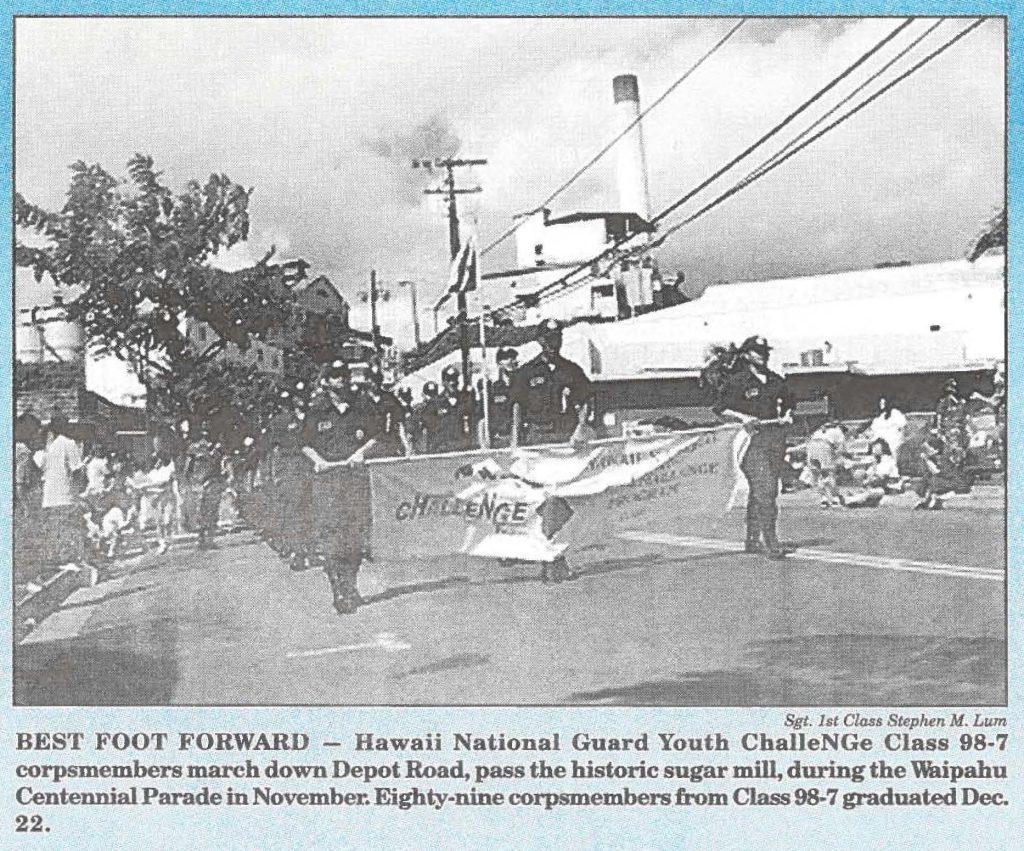 BEST FOOT FORWARD - Hawaii National Guard Youth ChalleNGe Class 98-7 corpsmembers march down Depot Road, pass the historic sugar mill, during the Waipahu Centennial Parade in November. Eighty-nine corpsmembers from Class 98-7 graduated Dec. 22.
