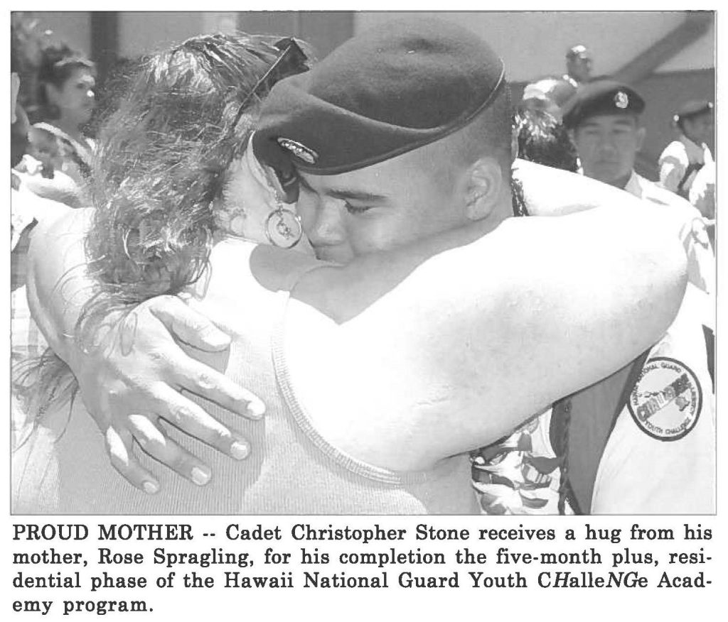 PROUD MOTHER -- Cadet Christopher Stone receives a hug from his mother, Rose Spragling, for his completion the five-month plus, residential phase of the Hawaii National Guard Youth CHalleNGe Academy program.