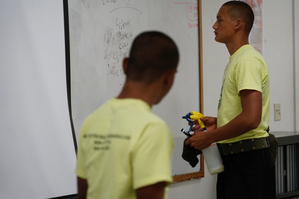 A Youth Challenge Academy Cadet reviews his answers to a government quiz during a civics lesson, March 15, 2019. (U.S. Air National Guard Photo by Tech. Sgt. Andrew Jackson)