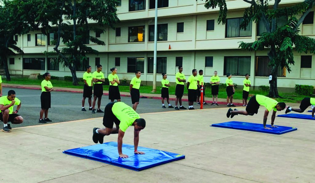 The Hawaii Youth Challenge Academy cadets (L-R) Andre Fletcher, Arvin Vila, Sei Wada, Marc Joshua Inay Bismonte, perform burpee exercises during the Junior Reserve Officer Training Corps virtual physical fitness competition Mar 30, 2021, Kapolei, Hawaii. The HIYCA cadets competed against 14 other schools from across the island and won the top three places in the novice group.(Courtesy Photo)