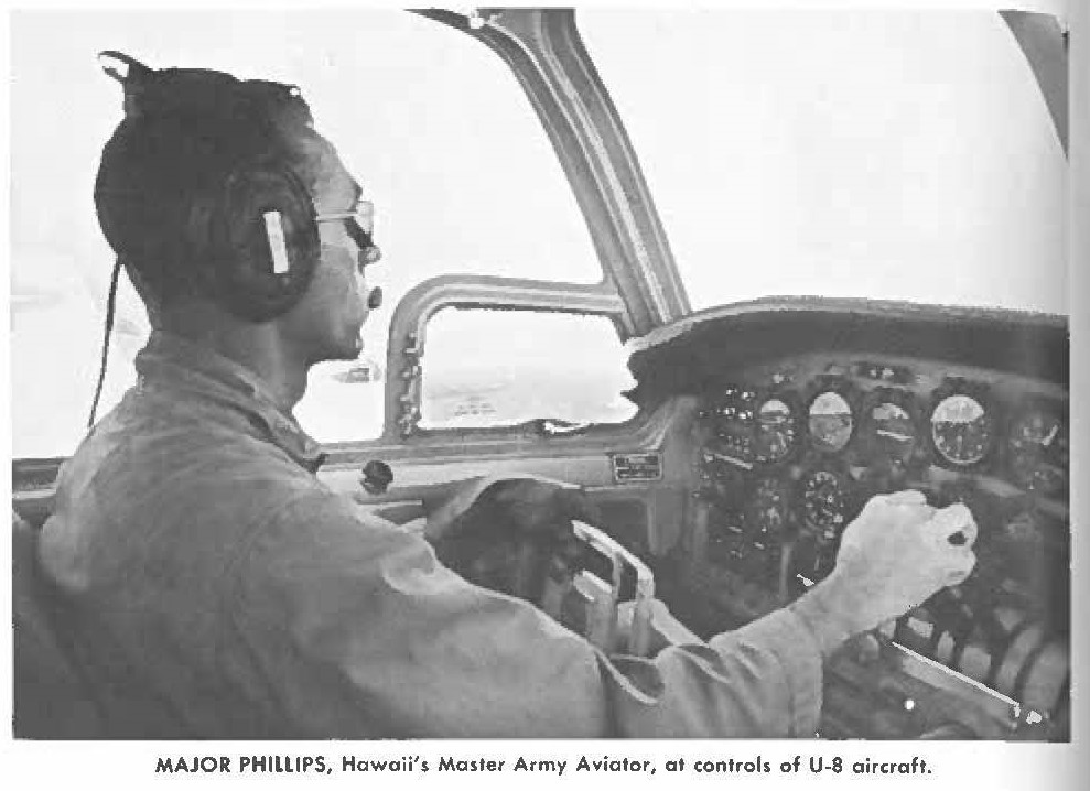 MAJOR PHILLIPS, Hawaii's Master Army Aviator, at controls of U-8 aircraft.