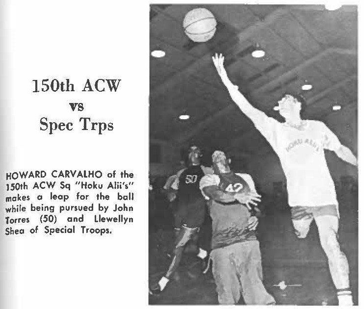 150th ACW vs Spec Trps HOWARD CARVALHO of the 150th ACW Sq "Hoku Alii's" makes a leap for the ball while being pursued by John Torres (50) and Llewellyn Shea of Special Troops.