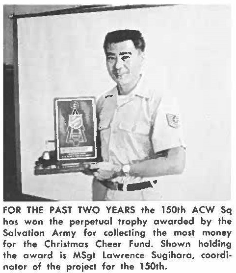 FOR THE PAST TWO YEARS the 150th ACW Sq has won the perpetual trophy awarded by the Salvation Army for collecting the most money for the Christmas Cheer Fund. Shown holding the award is MSgt Lawrence Sugihara, coordinator of the project for the 150th.