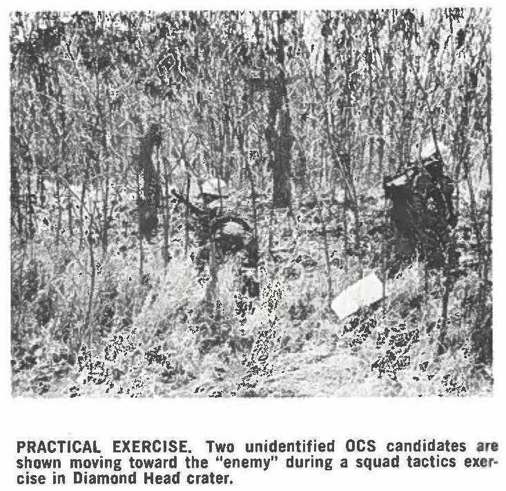 PRACTICAL EXERCISE. Two unidentified OCS candidates are shown moving toward the "enemy" during a squad tactics exercise in Diamond Head crater.