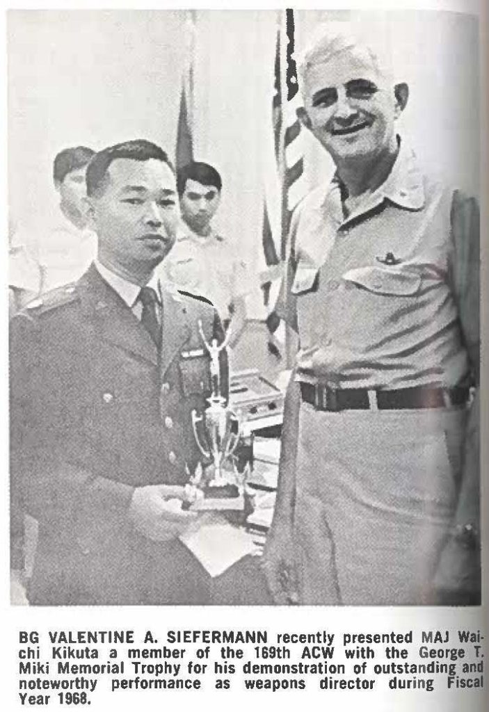 BG VALENTINE A. SIEFERMANN recently presented MAJ Waichi Kikuta a member of the 169th ACW with the George T. Miki Memorial Trophy for his demonstration of outstanding and noteworthy performance as weapons director during Fiscal Year 1968.