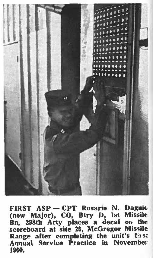 FIRST ASP- CPT Rosario N. Daguio (now Major), CO, Btry D, 1st Missile Bn 298th Arty places a decal on the scoreboard at site 26, McGregor Missile Range after completing the unit's, first Annual Service Practice in November 1960.