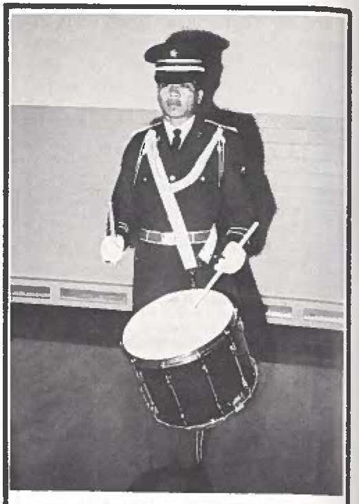 111TH BAND GETS NEW UNIFORMS- The 111th Band has received "snappy" new blue uniforms and are now without a doubt the best dressed band in the state. Band member SP4 Balligui Vinluan (drums), model the new uniforms for the HAWAII GUARDSMAN'S "Fashion Editor."