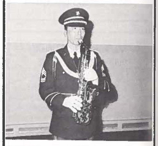 111TH BAND GETS NEW UNIFORMS- The 111th Band has received "snappy" new blue uniforms and are now without a doubt the best dressed band in the state. Band member MSG Bill Yuen (saxophone) model the new uniforms for the HAWAII GUARDSMAN'S "Fashion Editor."