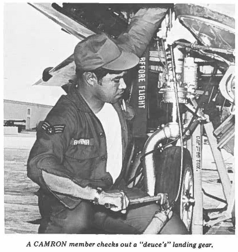 A CAMRON member checks out a "deuce's" landing gear.