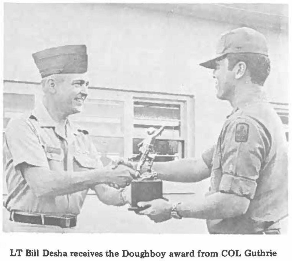 LT Bill Desha receives the Doughboy award from COL Guthrie