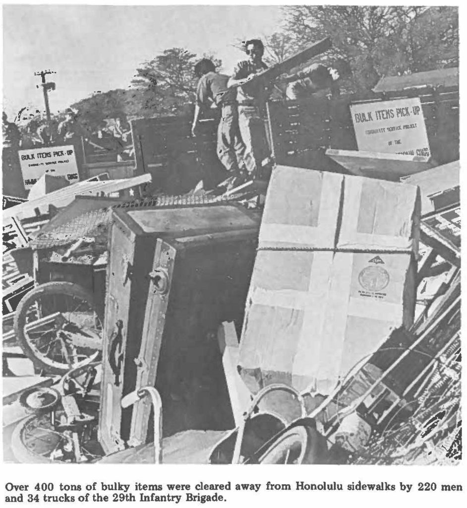 Over 400 tons of bulky items were cleared away from Honolulu sidewalks by 220 men and 34 trucks of the 29th Infantry Brigade.