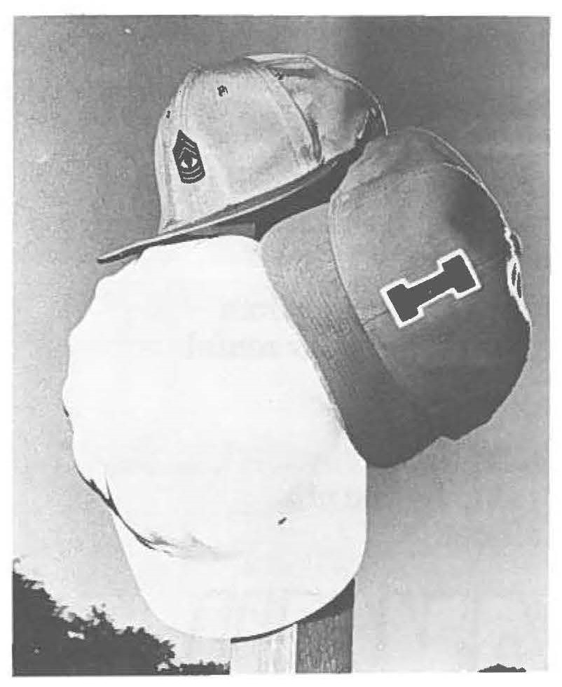 The different hats of 1SG Clement Hew