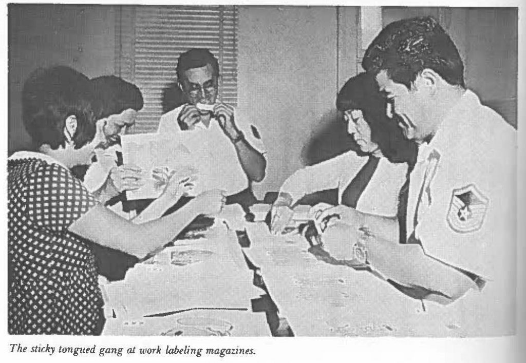 The sticky tongued gang at work labeling magazines.