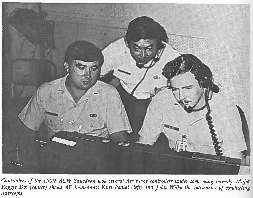 Controllers of the 150th ACW Squadron took several Air Force controllers under their wing recently. Major Reggie Do, (center) shows AF lieutenants Kurt Feazel (left) and John Wilke the intricacies of conducting intercepts.