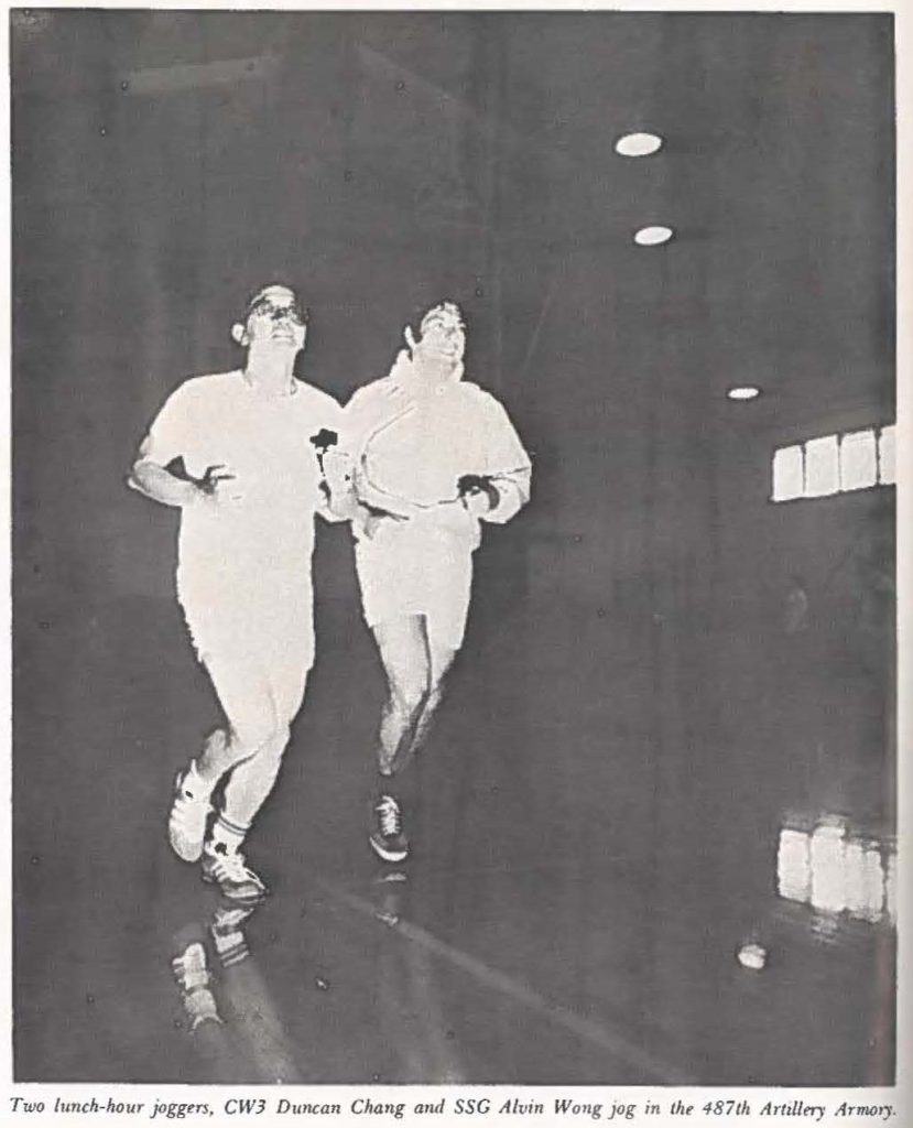 Two lunch-hour joggers, CWJ Ducan Chang and SSC Alvin Wong jog in the 487111 Artillery Armory.