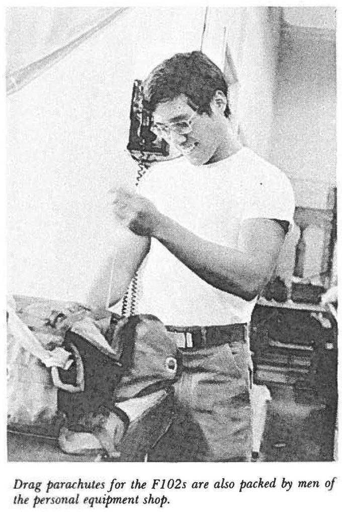 Drag parachutes for the F102s are also packed by men of the personal equipment shop.