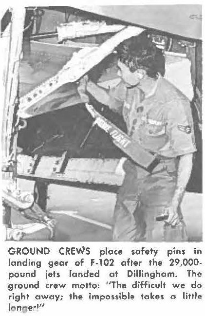 GROUND CREWS place safety pins in landing gear of F-102 ofter the 29,000-pounds jets landed at Dillingham. The ground crew motto: " The difficult we do right away; the impossible takes a little longer!"